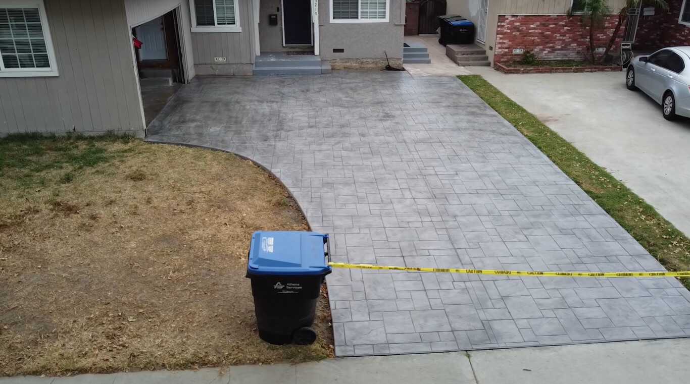 Professional stamped concrete driveway installation in Woburn, MA